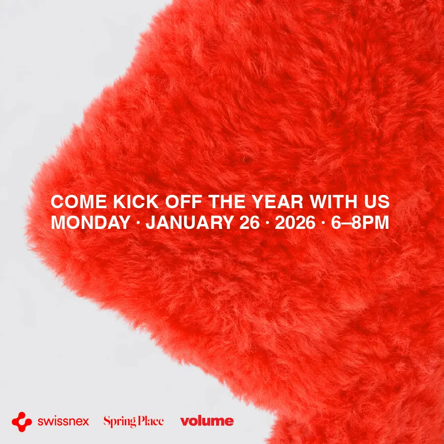 A red fluffy carpet laid out against a white background