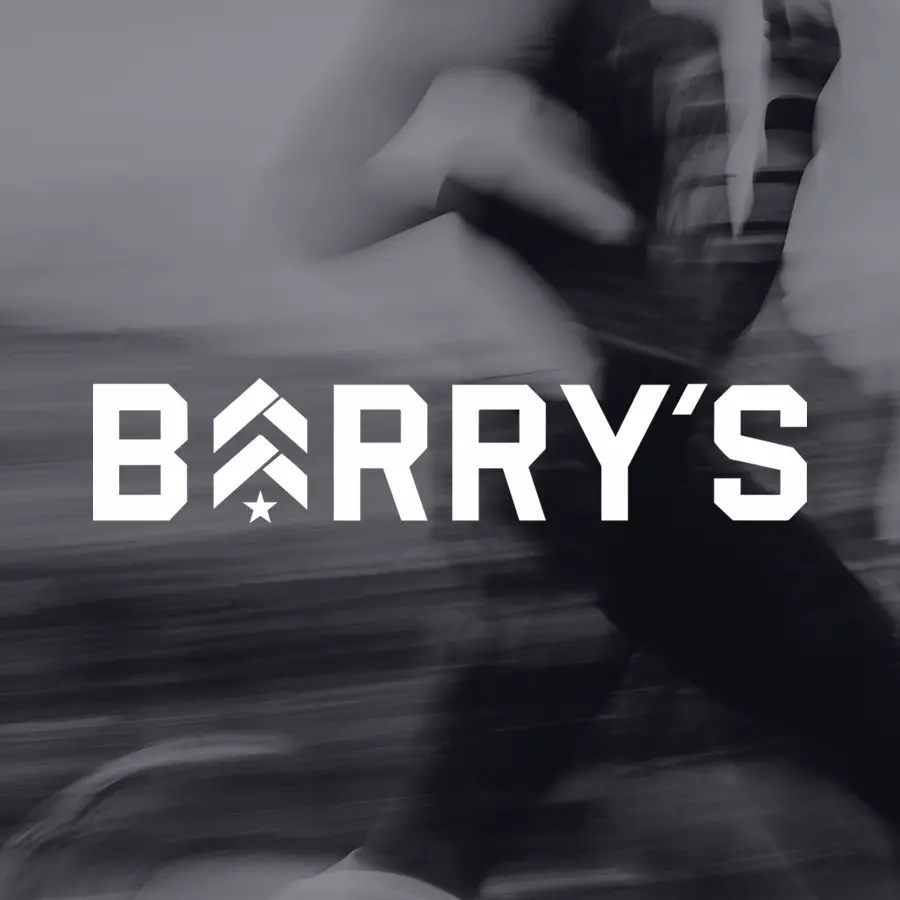 Black and white, blurry photo of person running, with Barry's logo overlaid on top