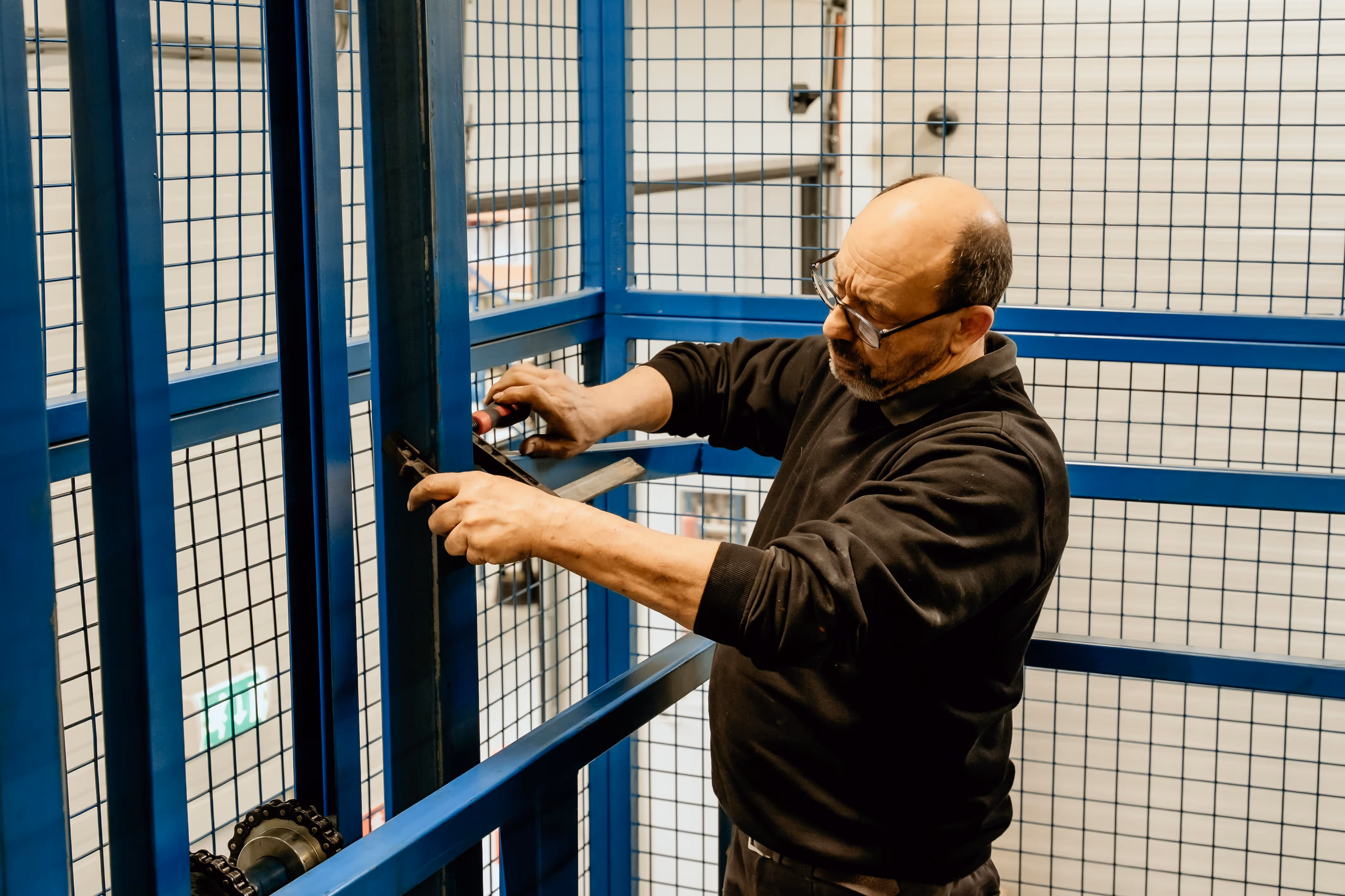 Person working in Cargo Lift System Lift
