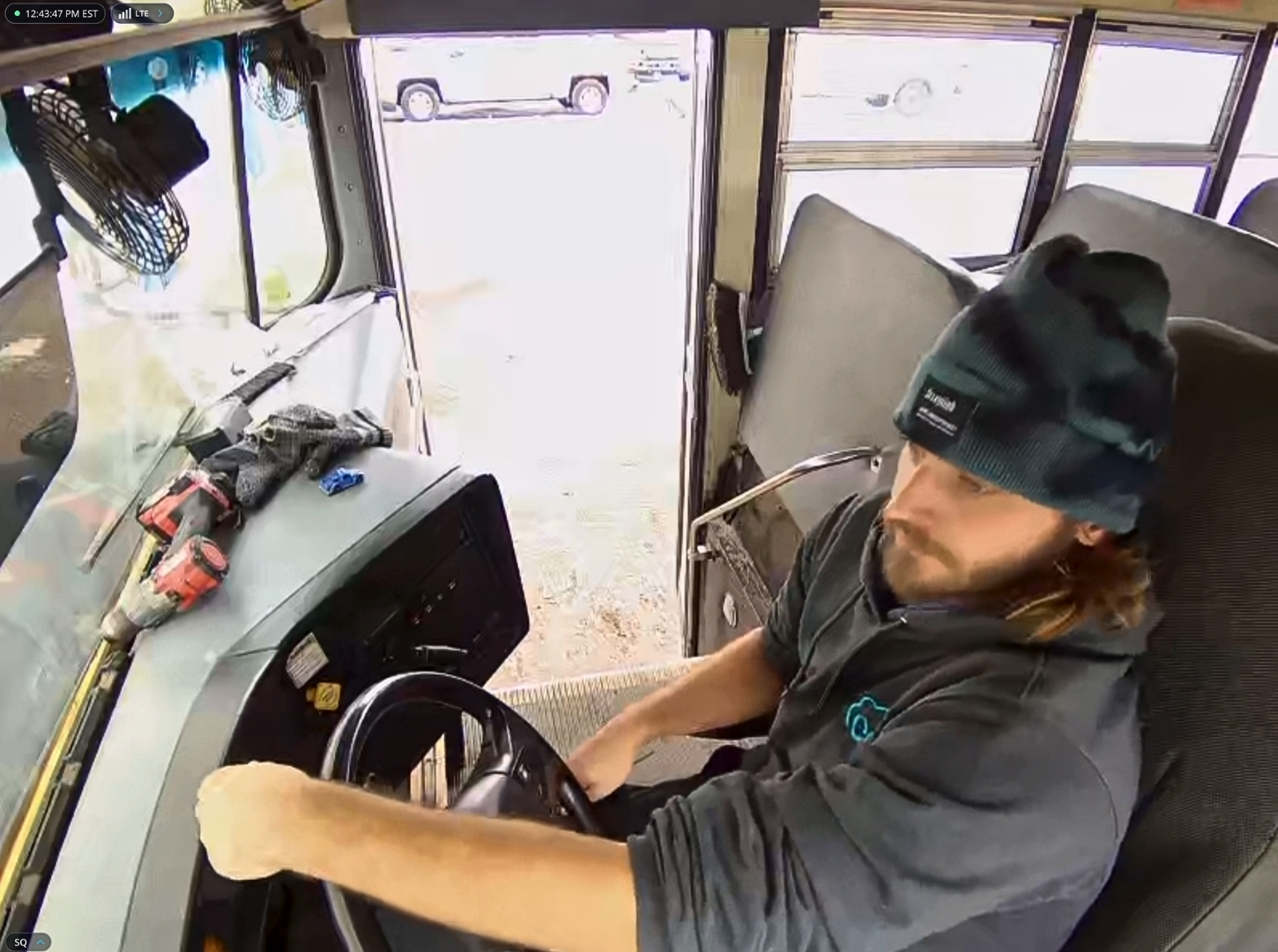 Cloud Managed Networks team installing Verkada Cameras in a school bus