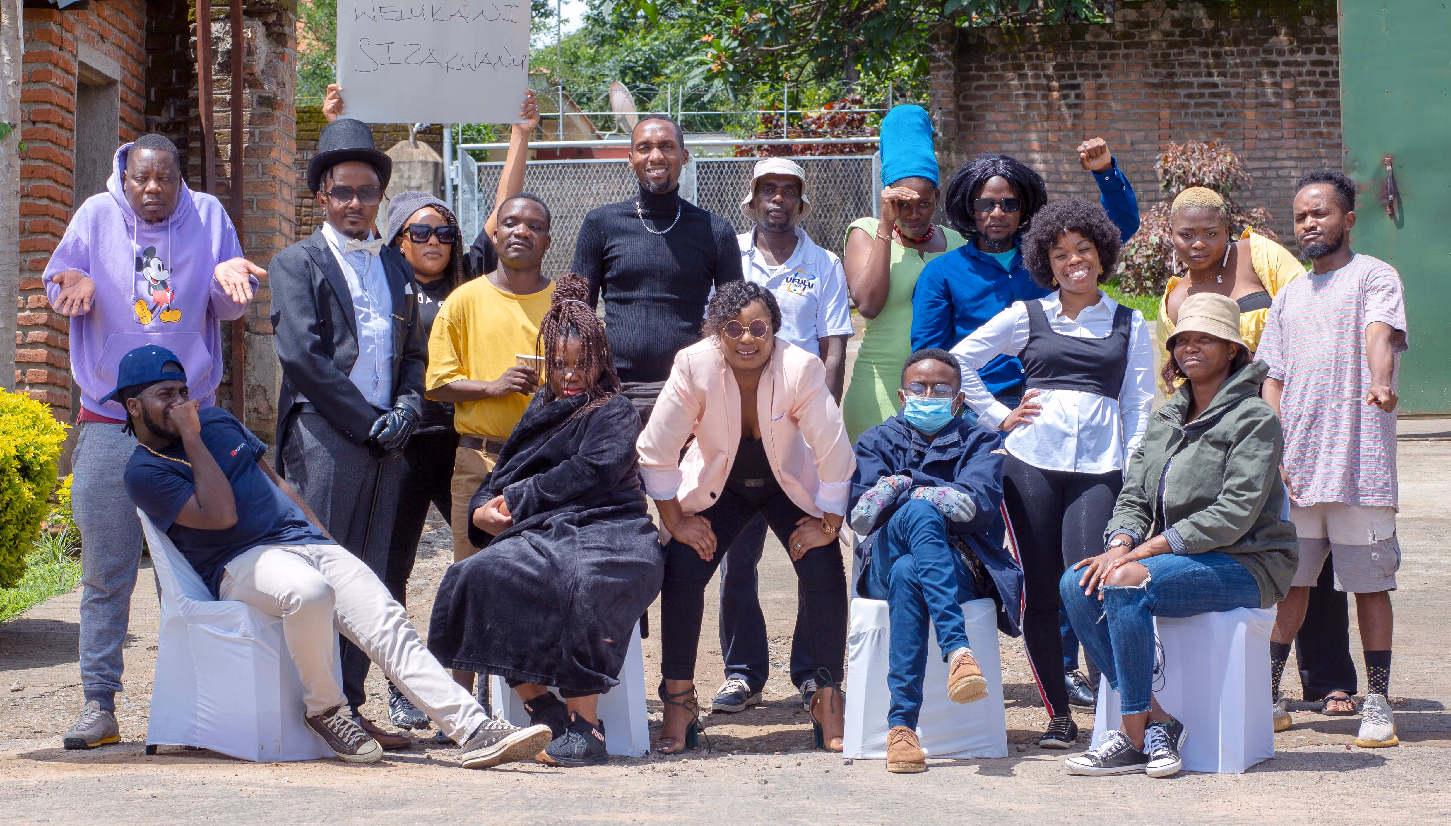 Corporate Graphics team dressed up for the end of year meme party