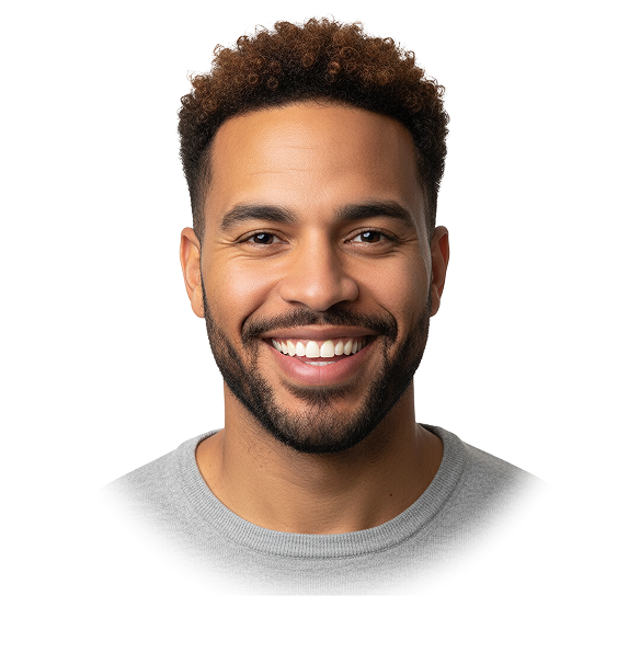 Smiling man with curly hair and beard wearing a light gray crewneck shirt.