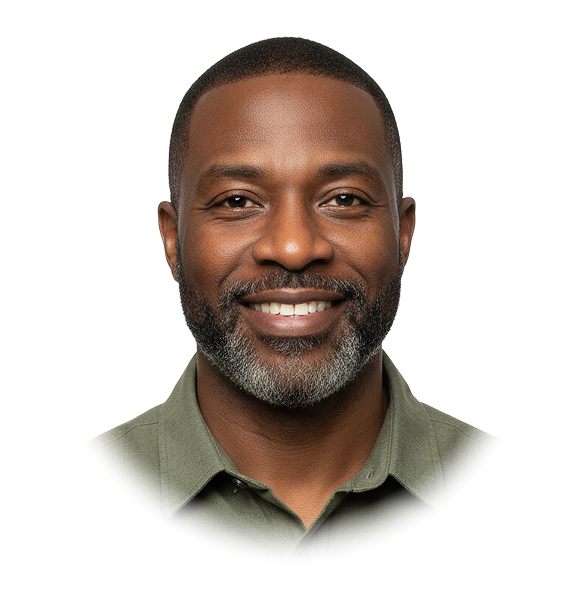 Smiling middle-aged Black man with short hair and salt-and-pepper beard wearing a green collared shirt.