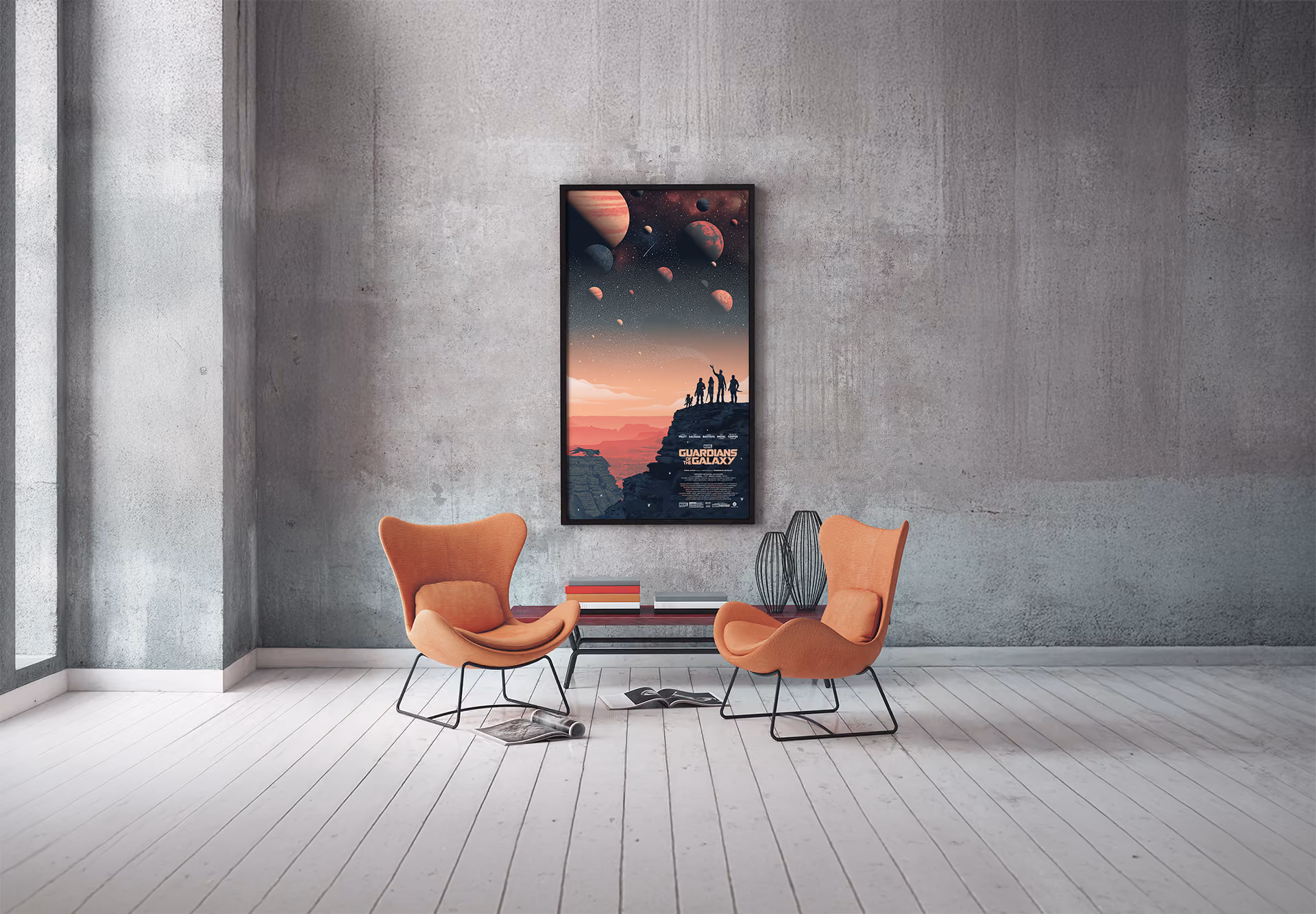 Poster des Guardiens de la Galaxie acroché au mur. Au premier plan deux fauteuils et une table sur laquelle sont posés des livres.