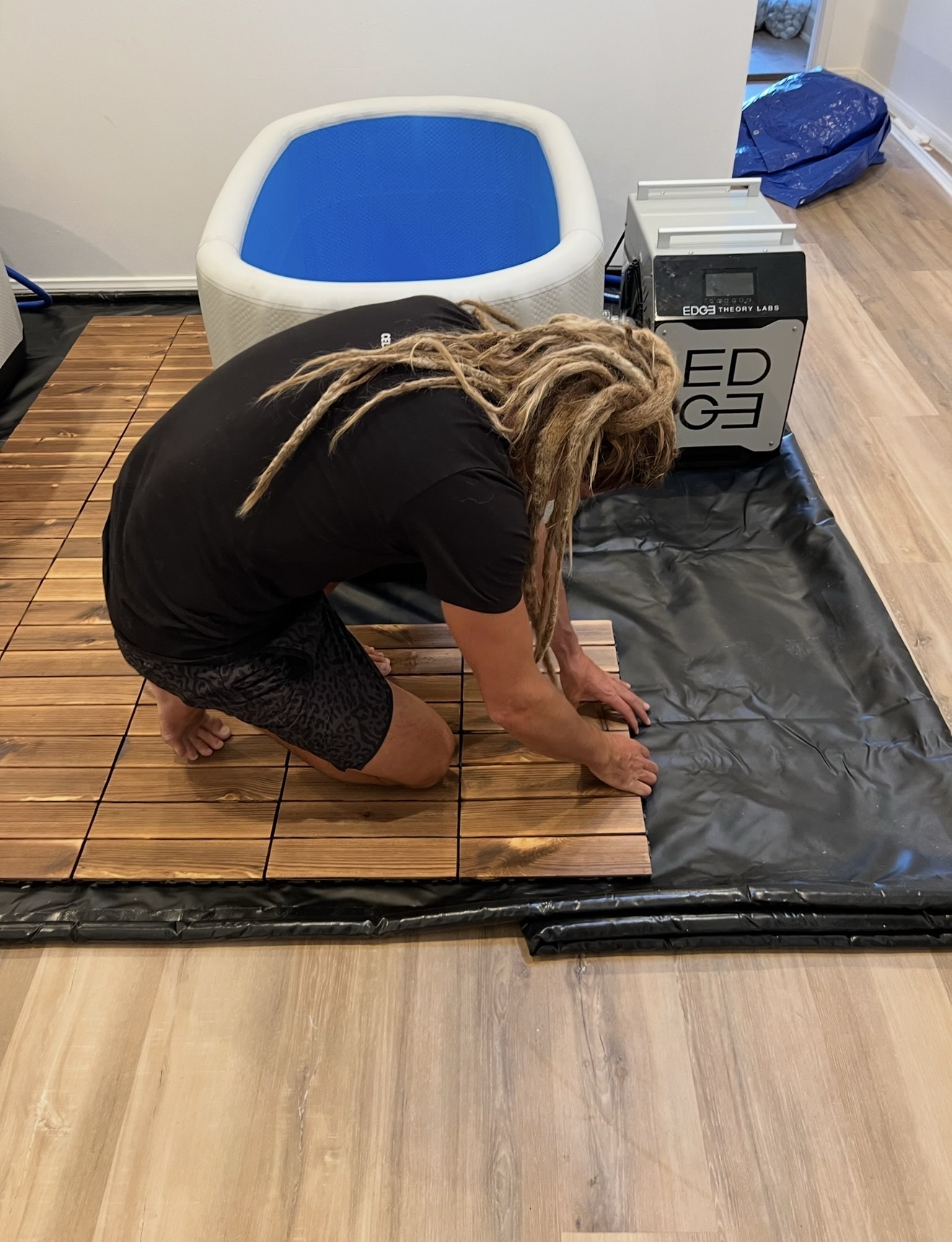 Austin Keen building the original Cold Plunge Therapy Lounge in 2022