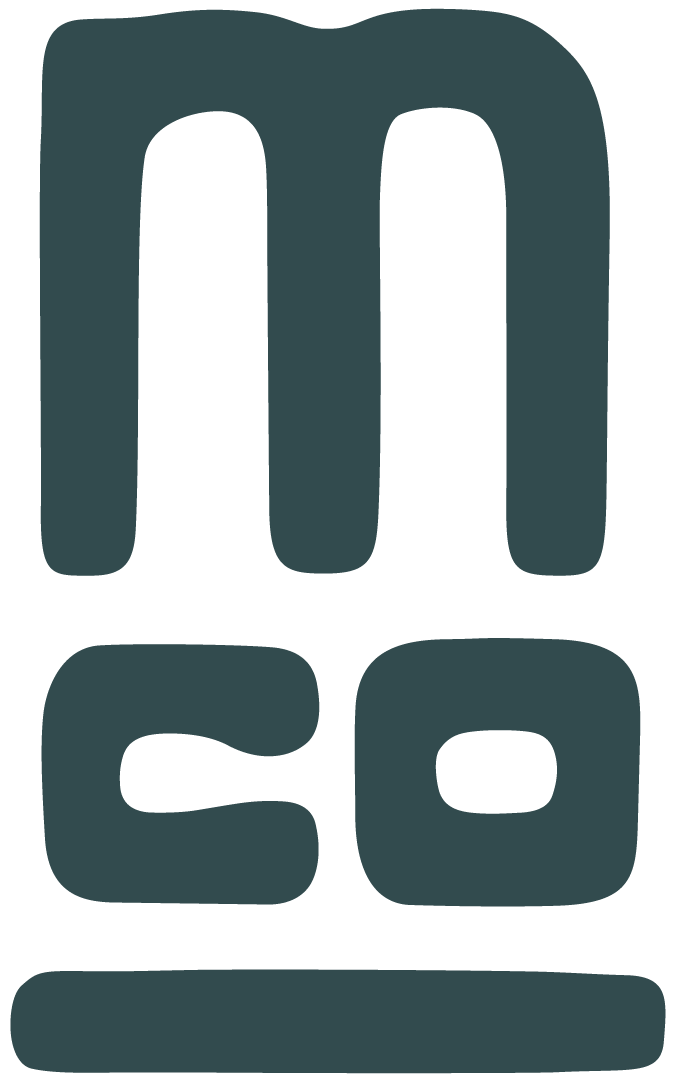 The Marchbanks Company logo and iconography in a teal blue.