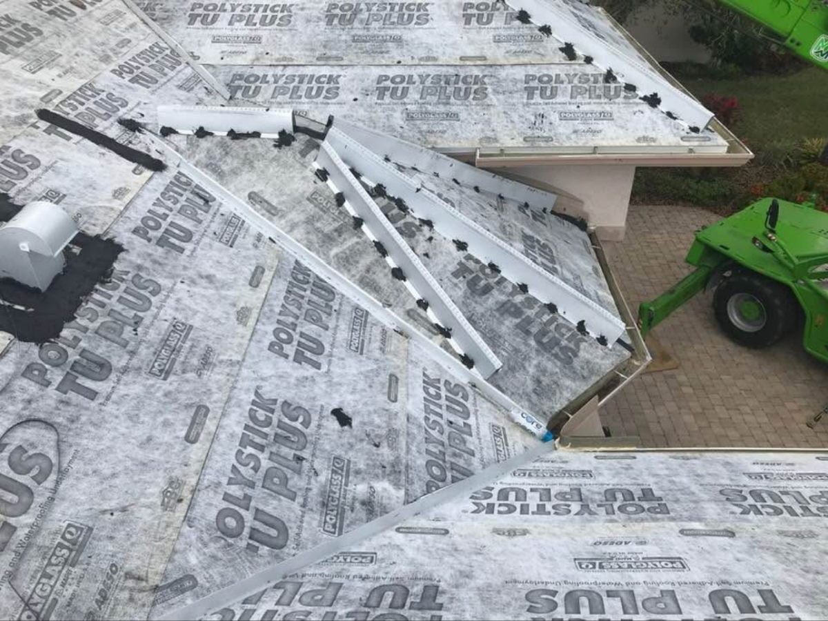 working on damaged roof