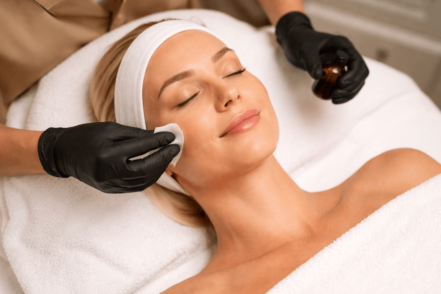 Patient receiving a VI Peel facial treatment at Shorr Beauty in Costa Mesa, California to improve skin tone and texture