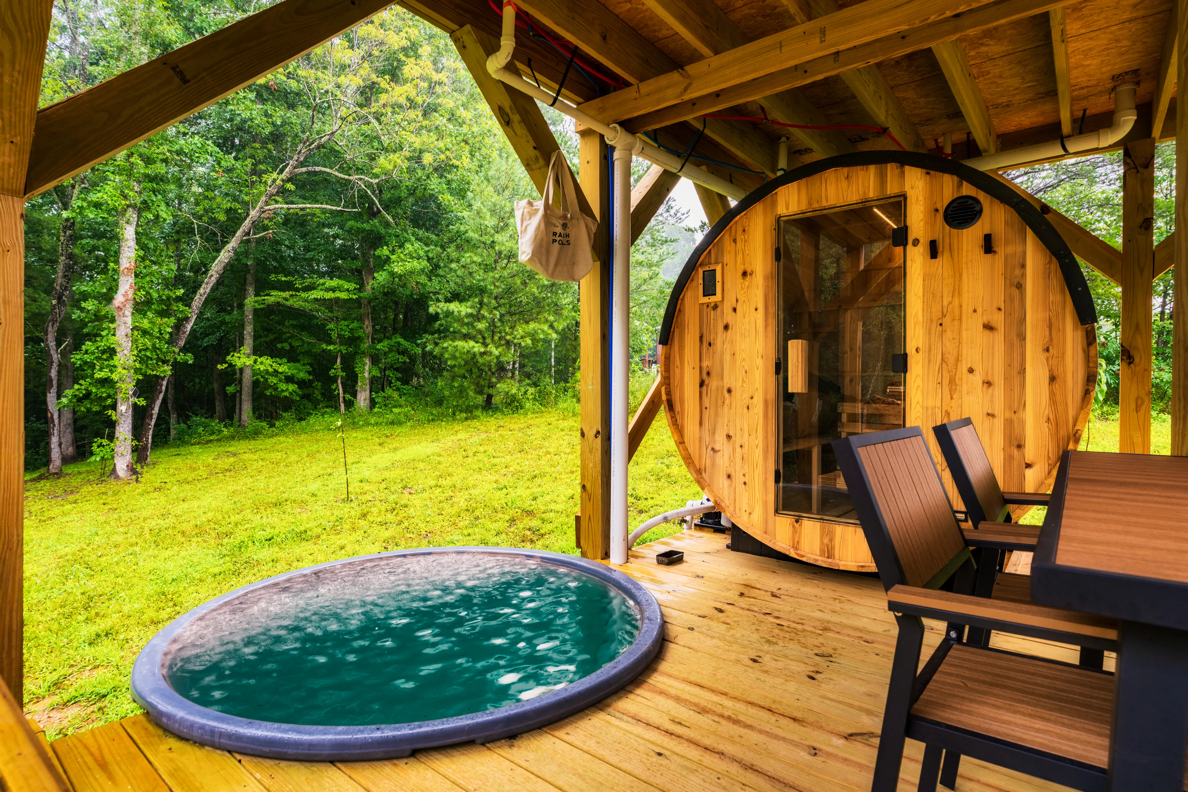 Private sauna and cowboy plunge pool on the deck at Black Creek Treehouse