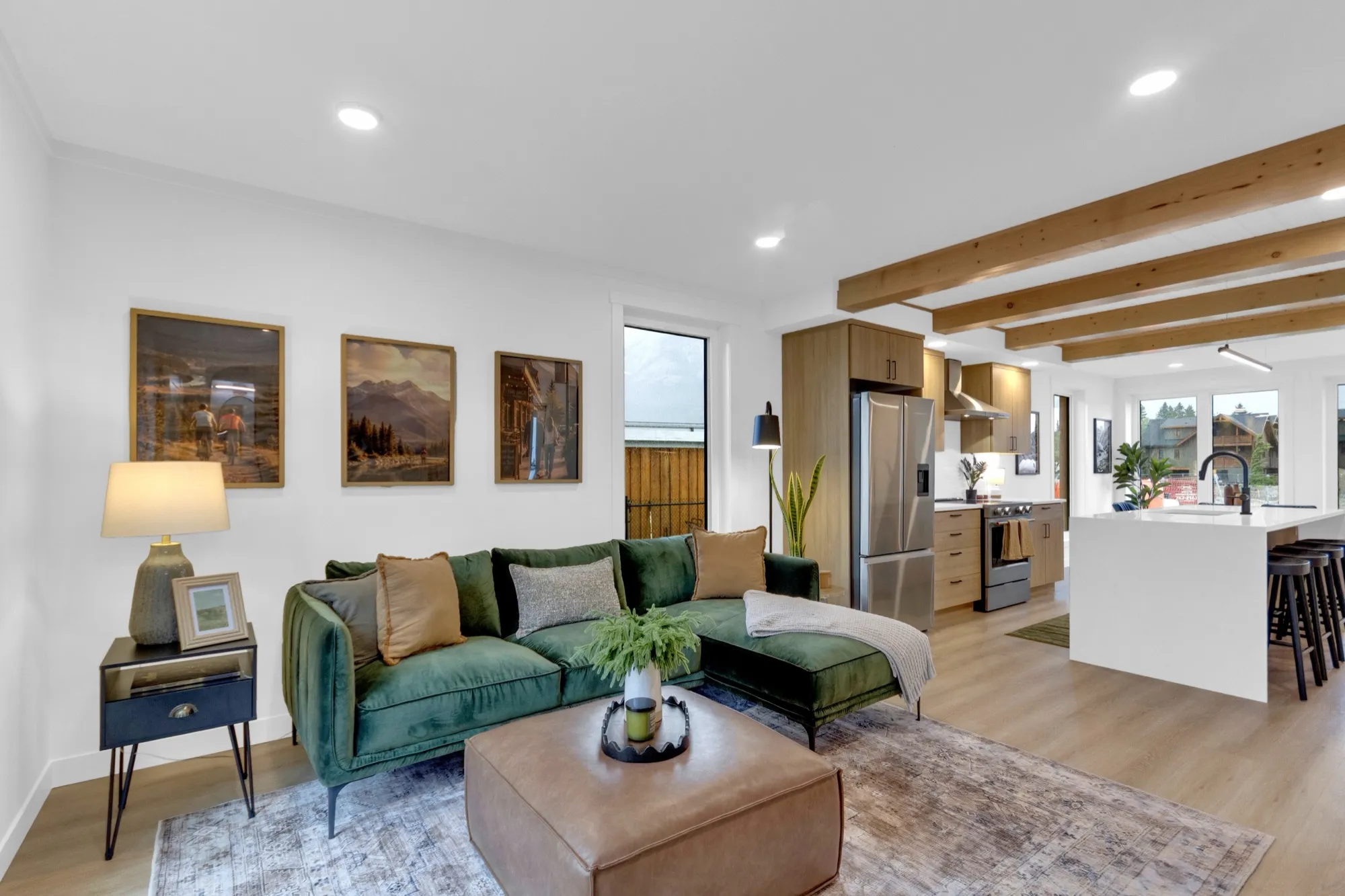 The open-plan kitchen and living room of a Colliery Parc townhome in South Canmore