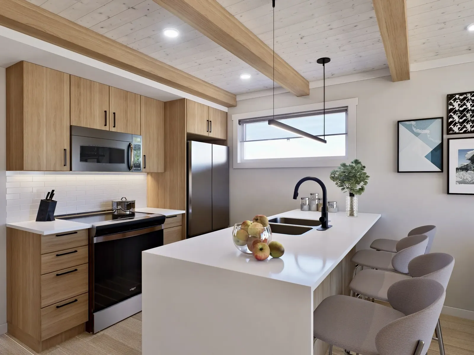 The kitchen of a main-floor two-bedroom home at Colliery Parc in South Canmore