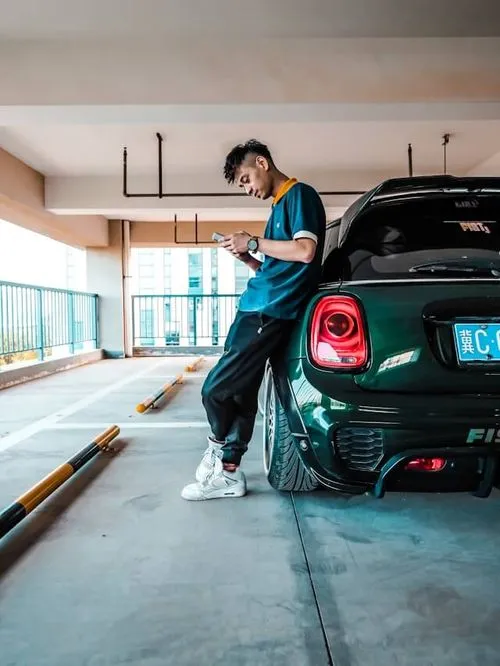 man near car