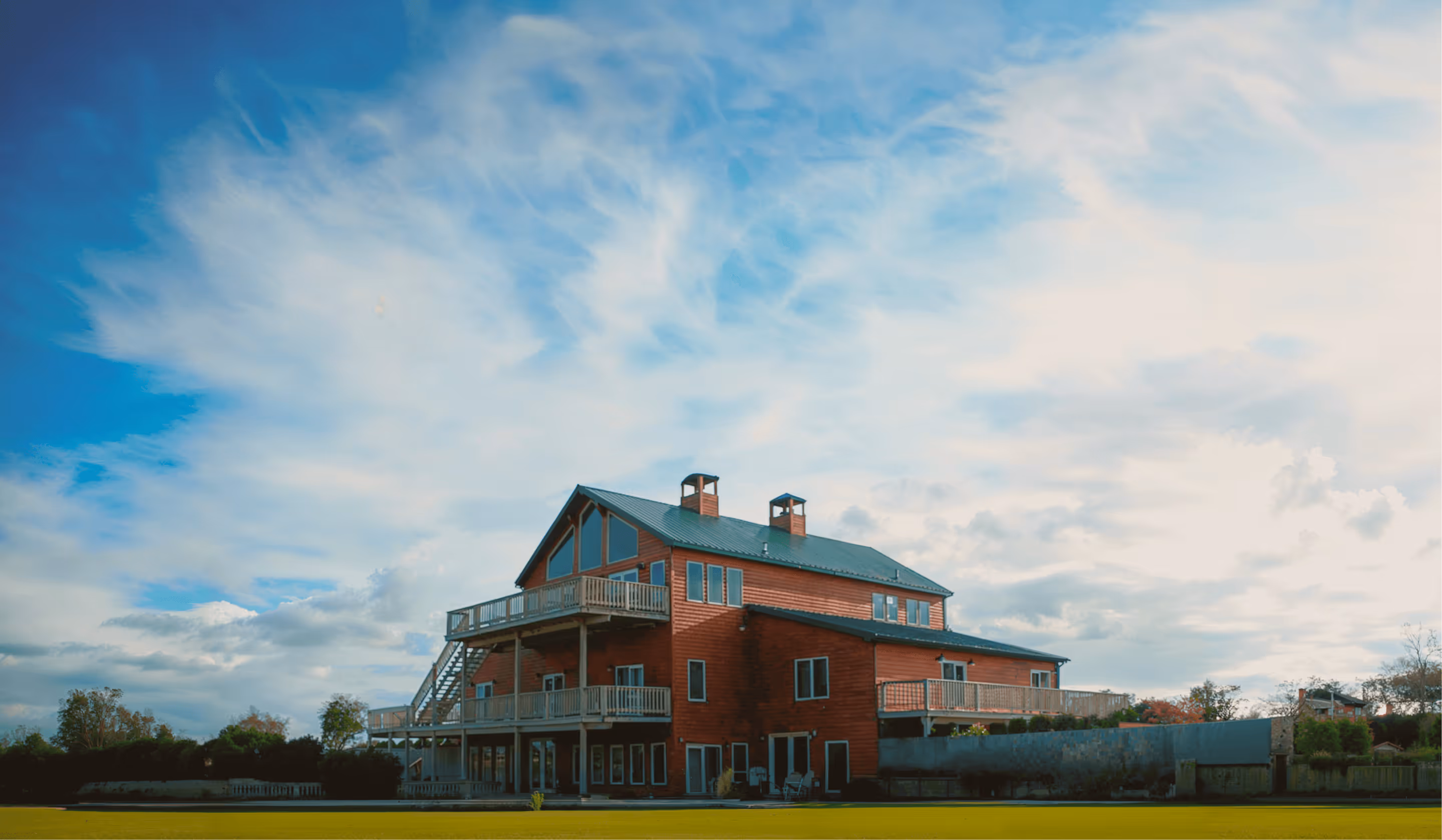 A beautiful panoramic view of the ReWild Ranch's Lodge.