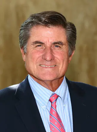 Portrait photo of Charlie Pasarell, tennis star and golf course architect