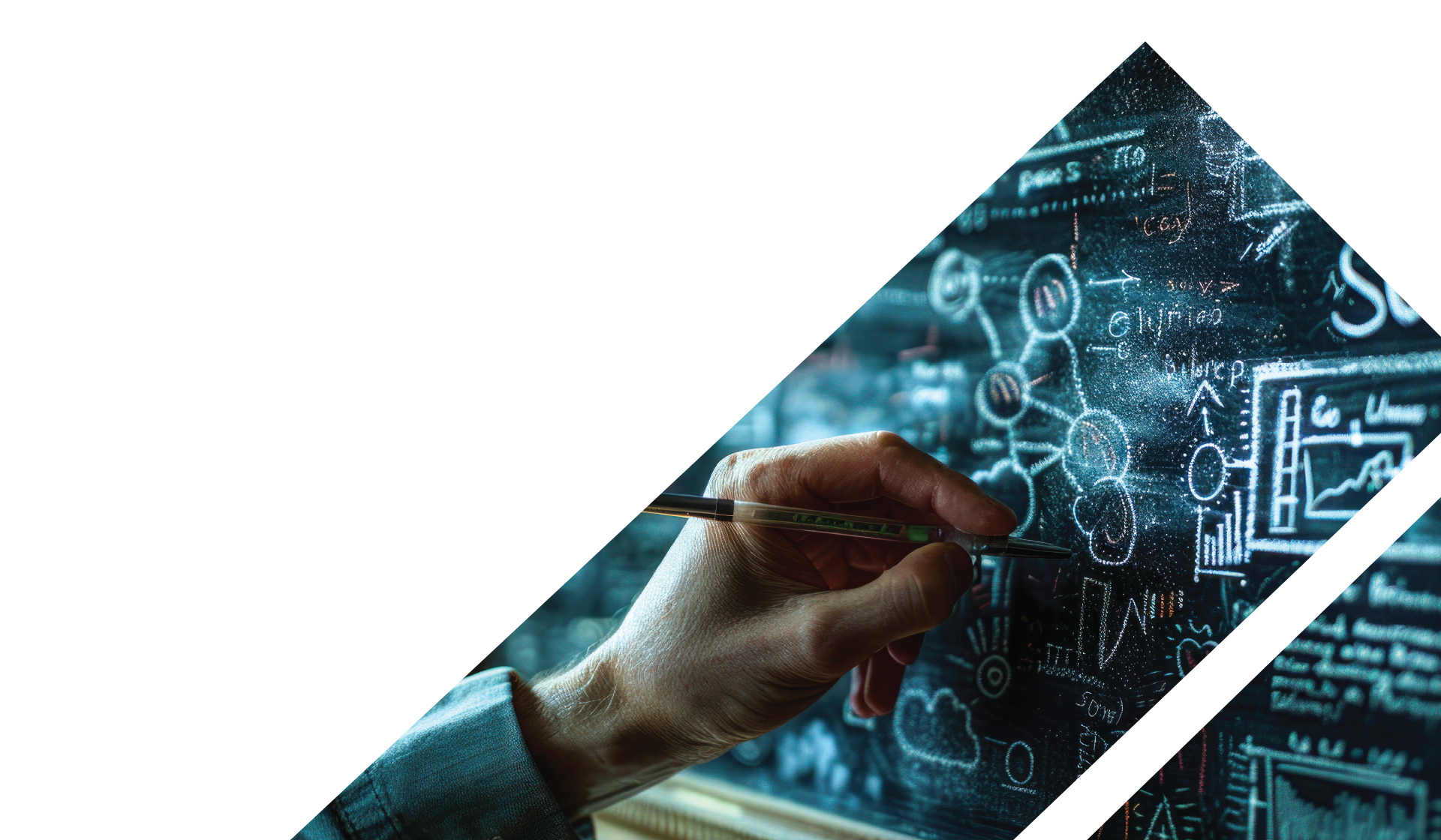 A hand writing on a black board. 