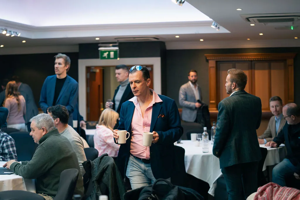 A room of people networking at the Blue Bricks Pigeons and Property networking event