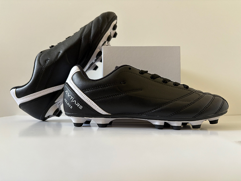 Side angle shot of black and white Avtiare Classico Shoes