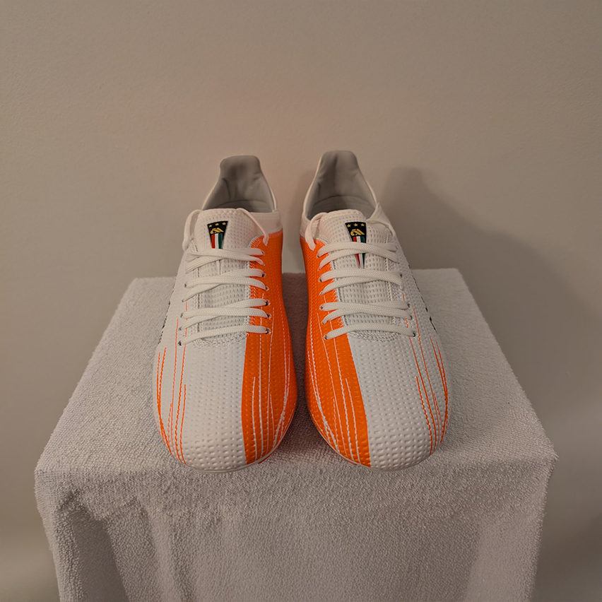 Front and top angle of the white and orange Avtiare Velocita Shoes