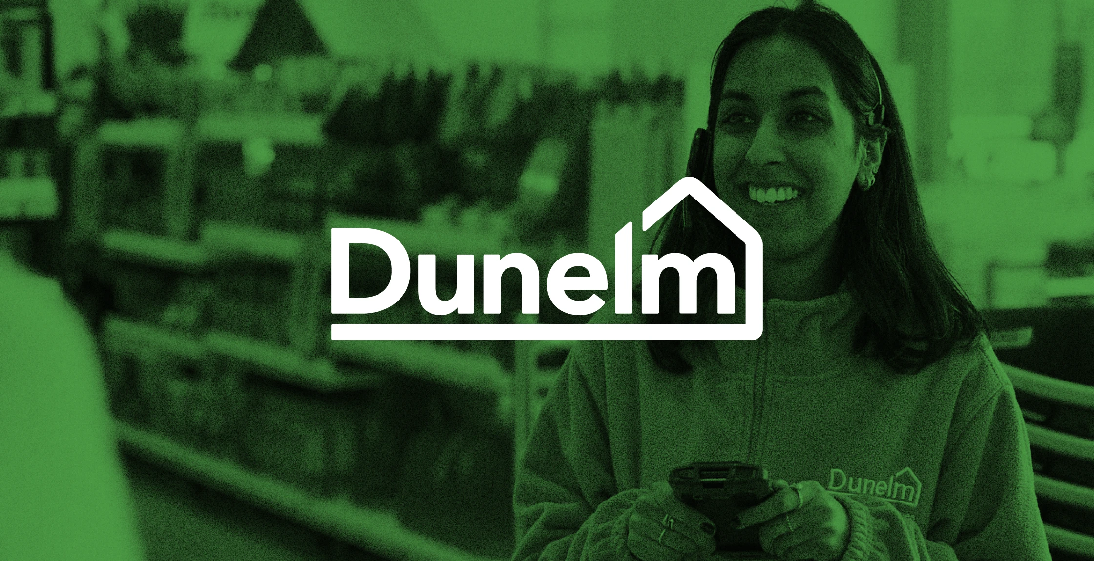 Dunelm logo over a green-tinted photo of a smiling store employee in a Dunelm uniform