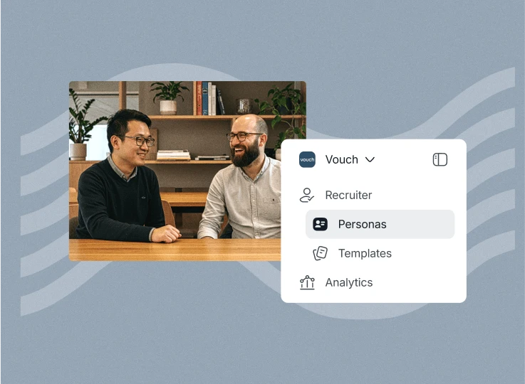 Two colleagues laughing at a table beside the Vouch menu with Recruiter, Personas, Templates and Analytics