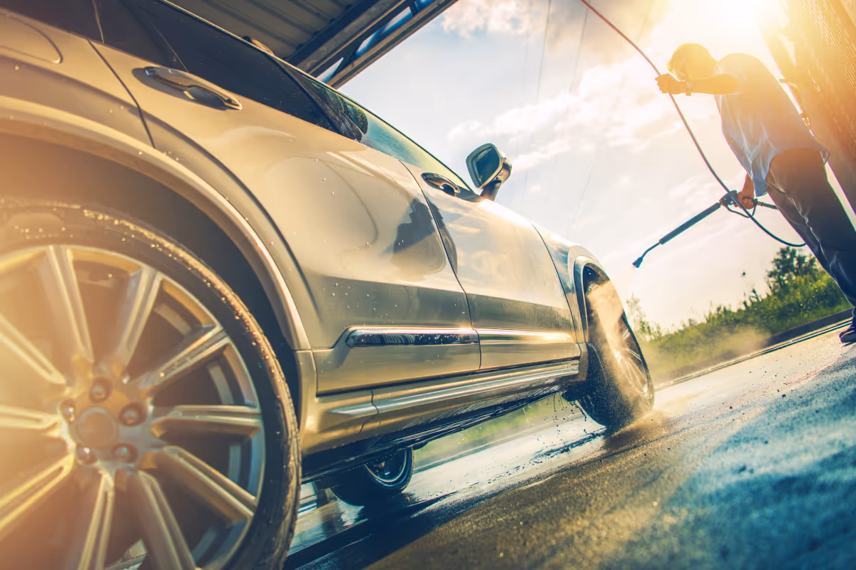 Men washing modern car