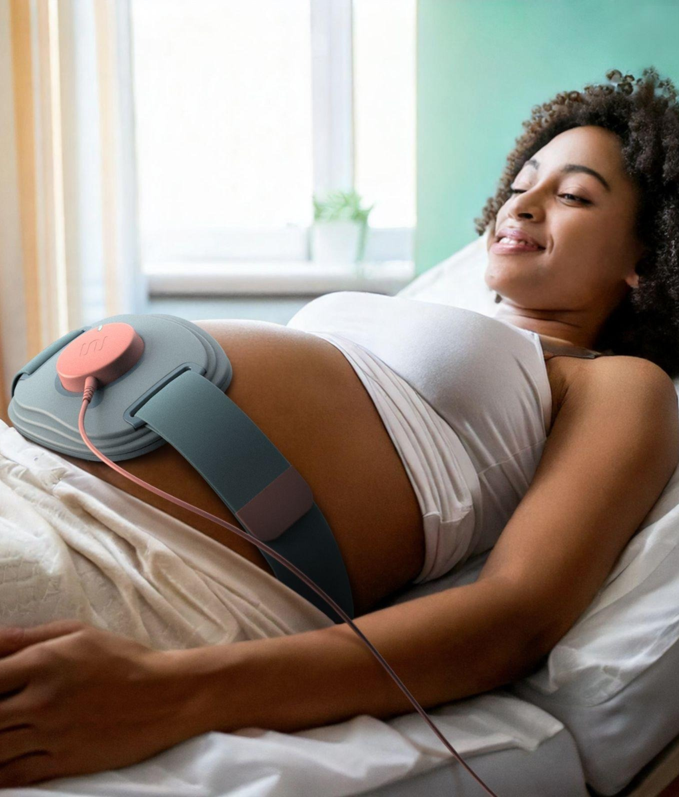 Patient wearing the Wavelet Medical device in a hospital setting.