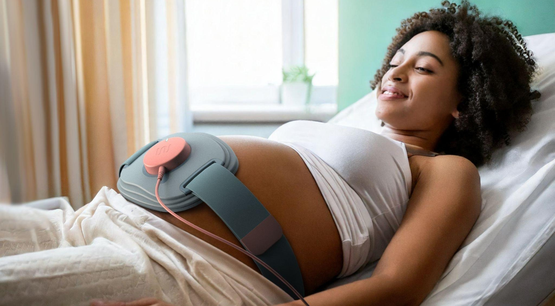 Patient wearing the Wavelet Medical device in a hospital setting.
