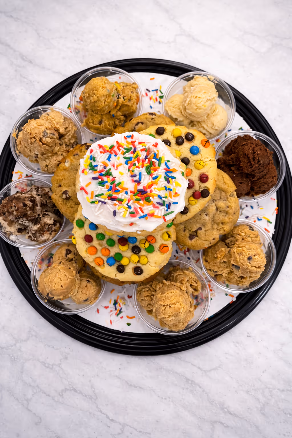 Large party box from Cookie Dough Creations featuring oversized cookies and edible cookie dough cups