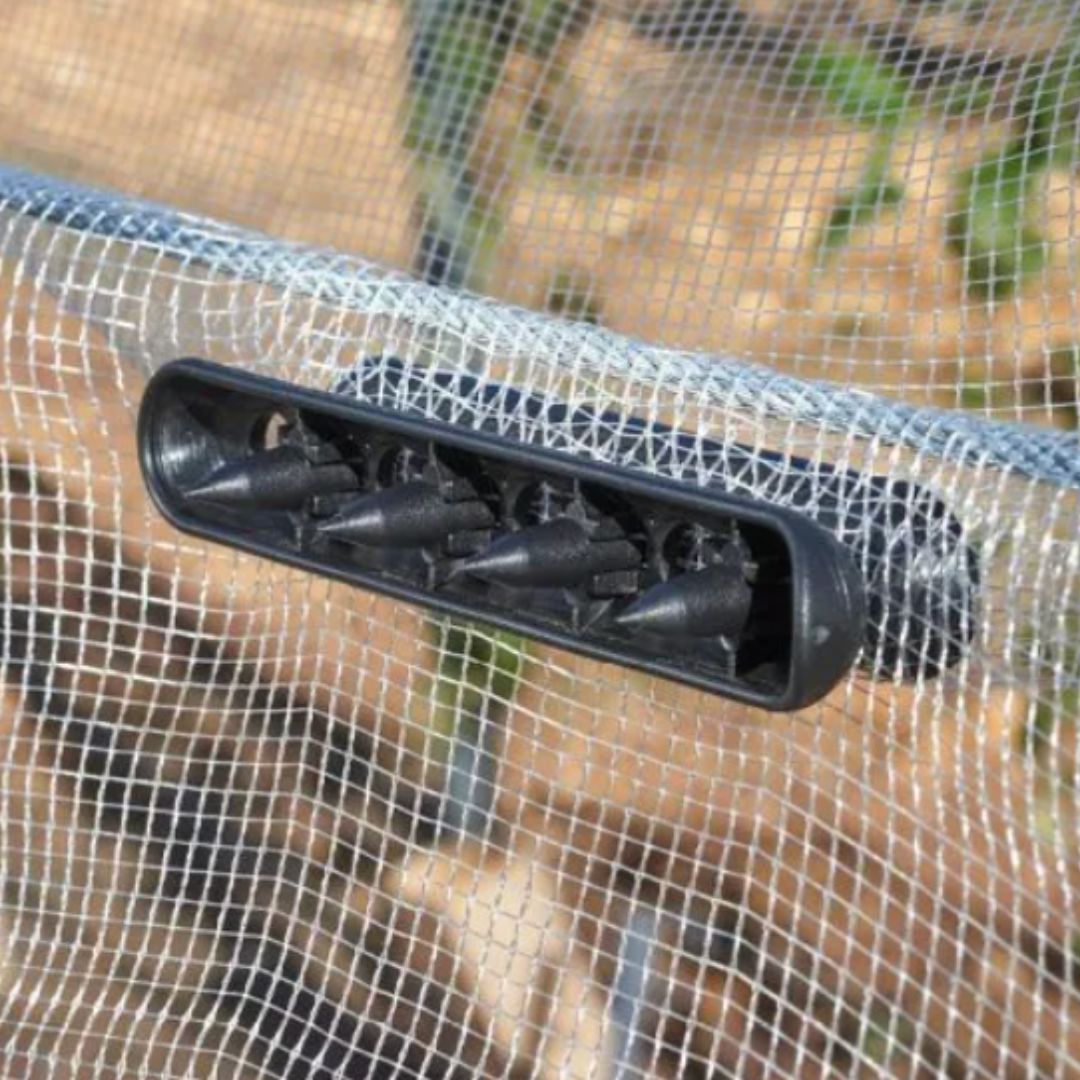conector radial para mallas, conector para mallas agrícolas, sujetador radial de malla, clip radial para malla agrícola.