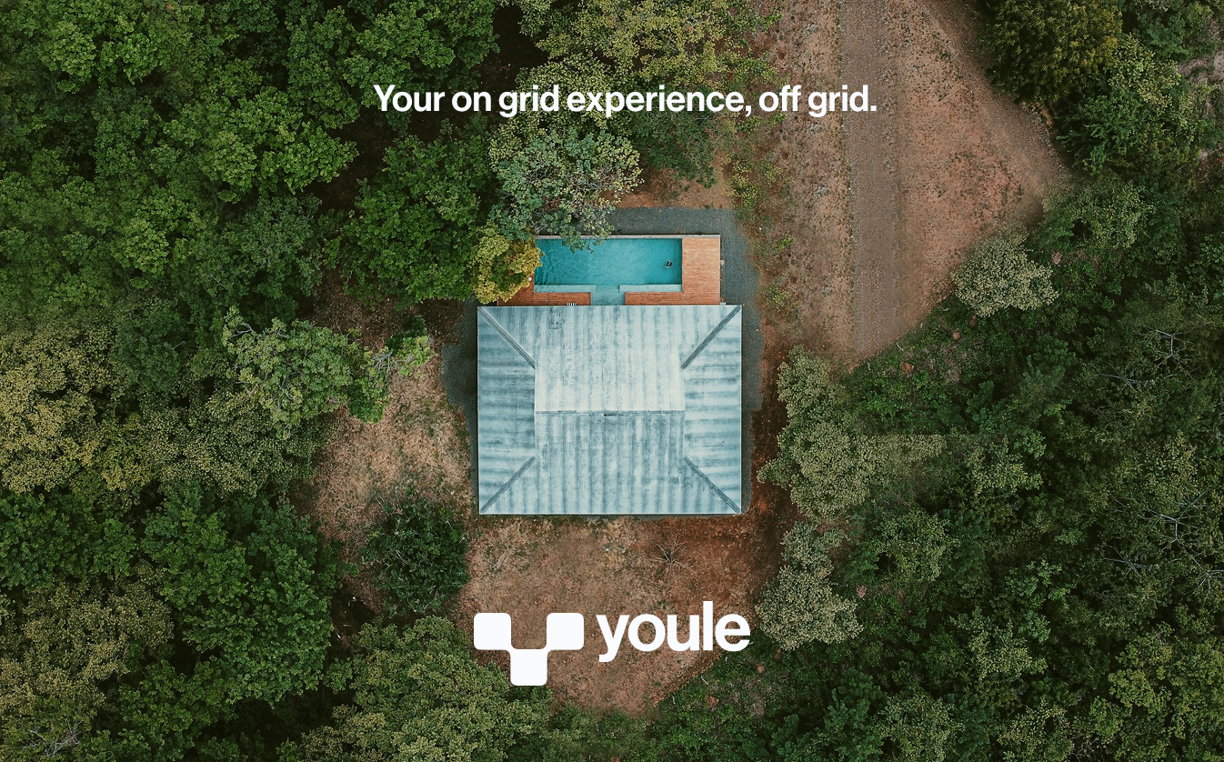 A man and a woman use a tablet to make interior design choices at Bam Homestudios