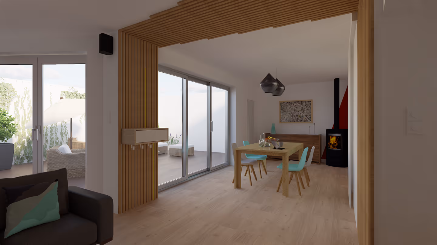 Intérieur d'un petit appartement avec un sol en bois et une table à manger.
