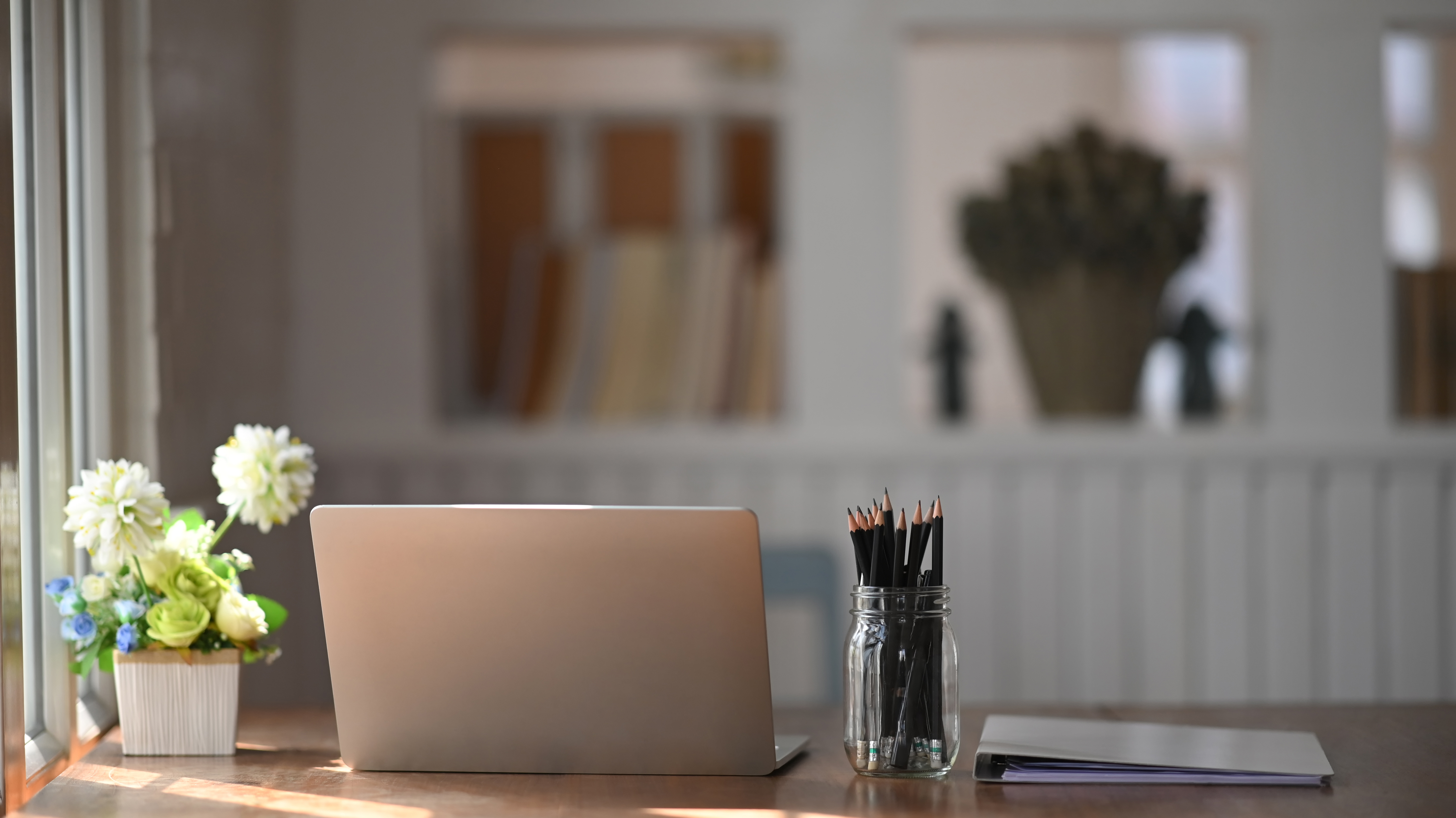 Empty desk with laptop