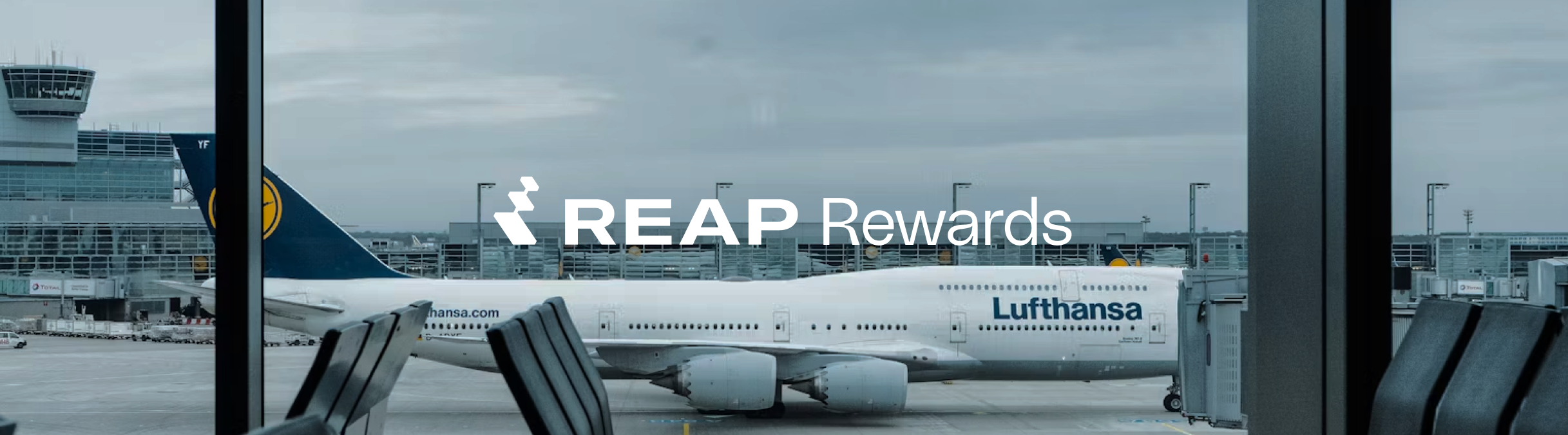 Reap Rewards banner — airport gate view of a Lufthansa aircraft, representing airline lounge access and travel rewards for Reap corporate card holders.
