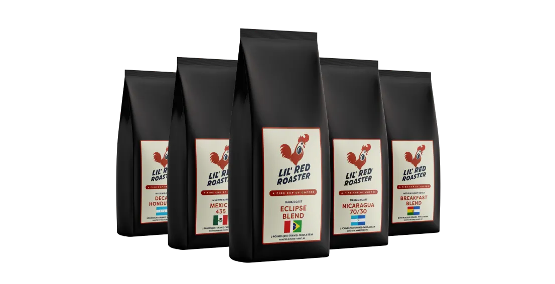 Five black coffee bags of Lil' Red Roaster featuring blends: Decaf Honduras, Mexico 435, Eclipse Blend, Nicaragua 70/30, and Breakfast Blend.