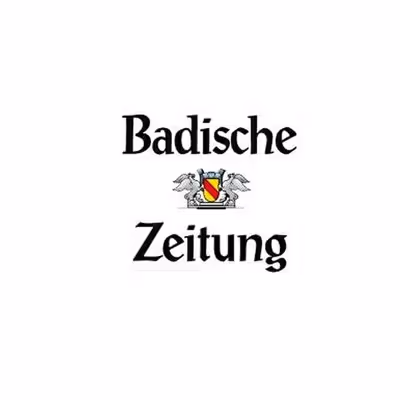 Logo der Badischen Zeitung mit stilisiertem Wappen und zwei Pferden.