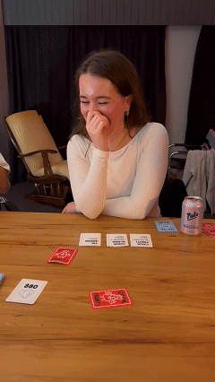 A female laughing playing CockFight!