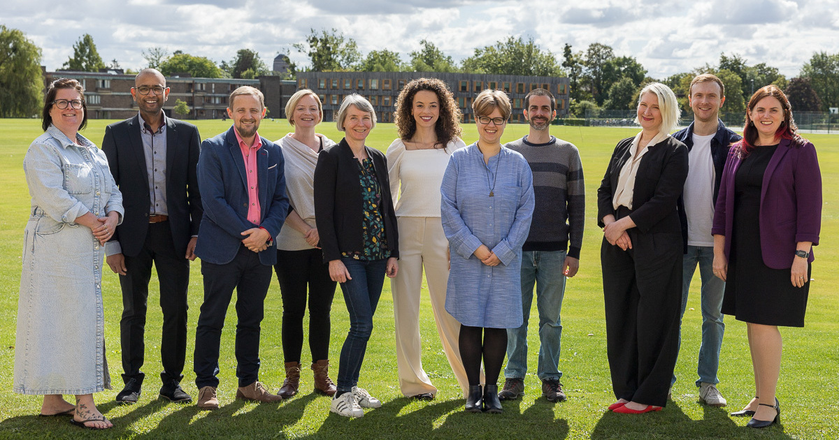 The Thiscovery team having a team photo outdoors in Cambridge.