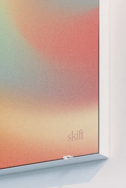 Close-up of a pastel-colored gradient artwork signed 'skift' in the bottom right corner.