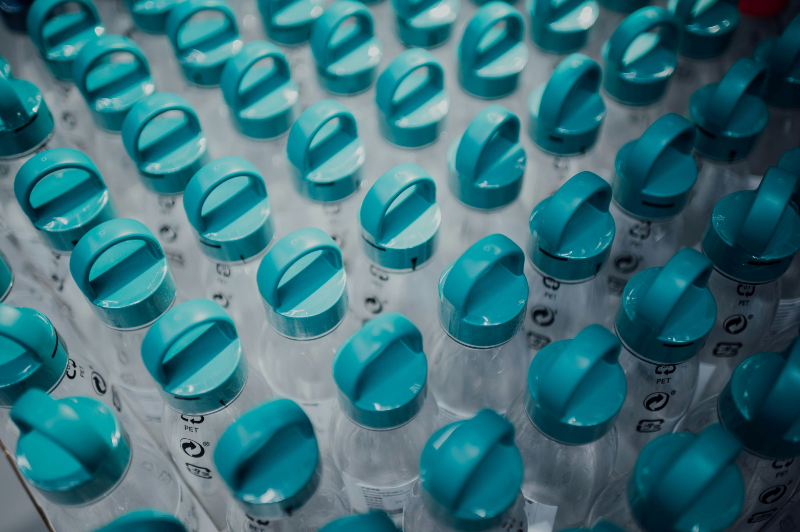 Pharmaceutical bottles with blue tops

