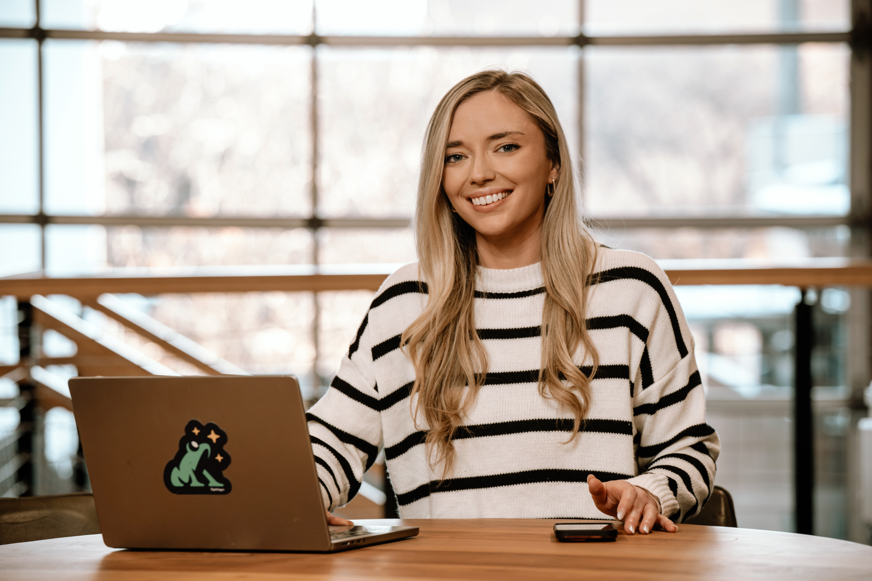 Photo of a model with a laptop for live training 