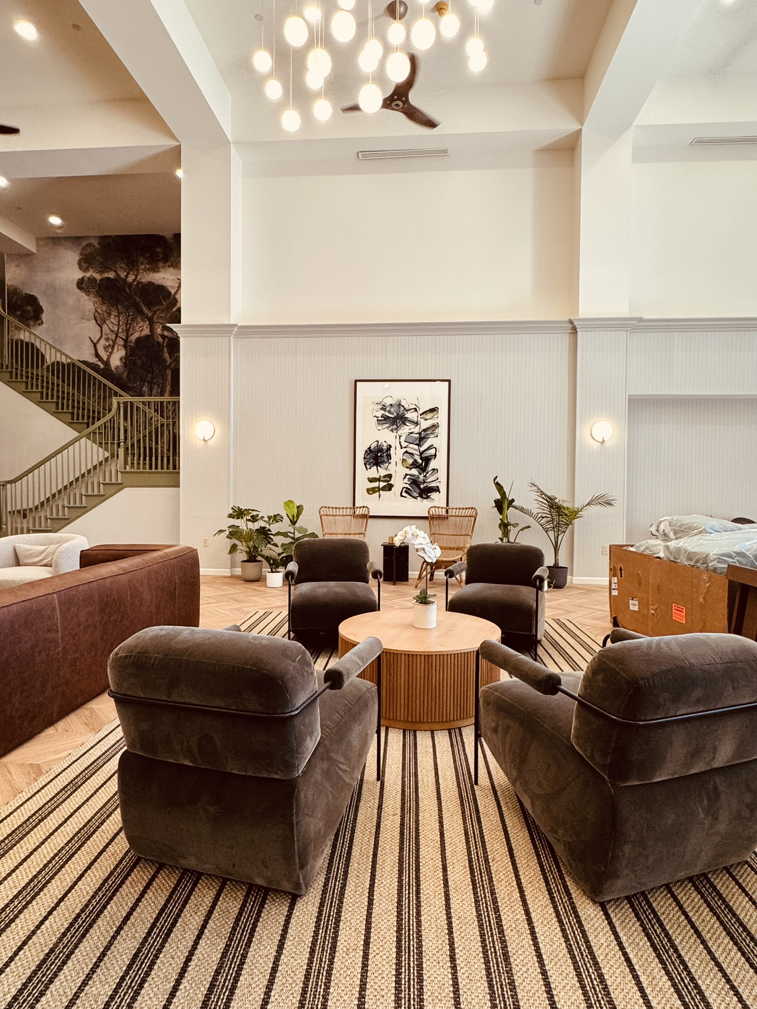 Well-managed lounge space in converted hotel property at Ainsley Dallas