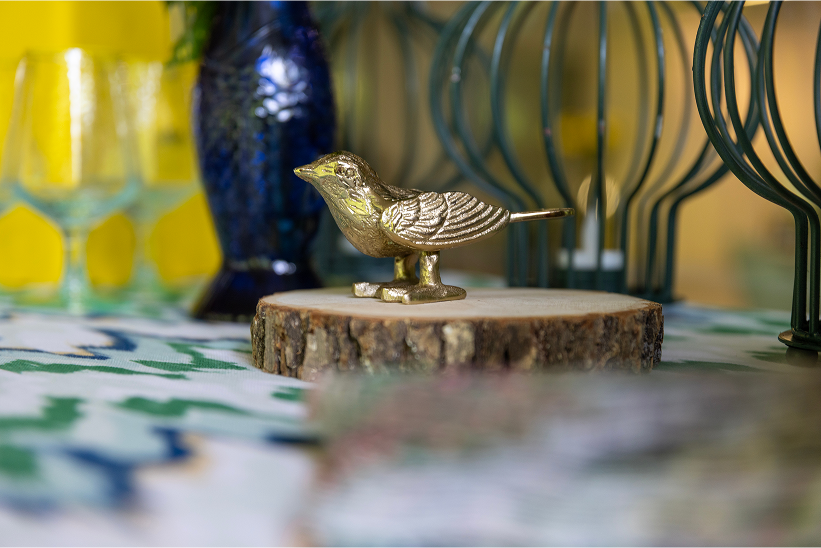 A photo of a brass Goldfinch