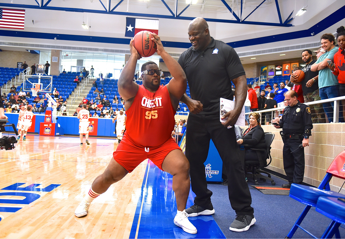 Photo of Cream Biggums and Shaq at a Cheez-It basketball event. 