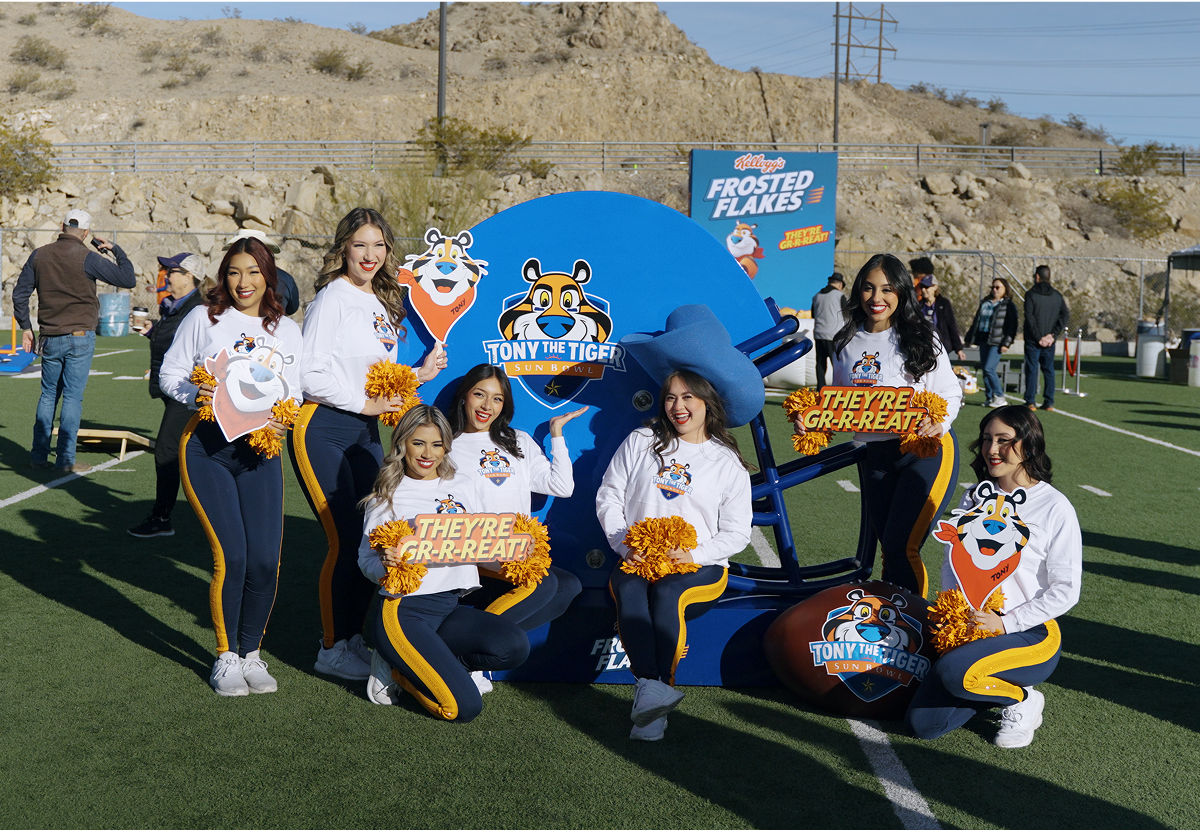 A photo of people at a Frosted Flakes football activation.