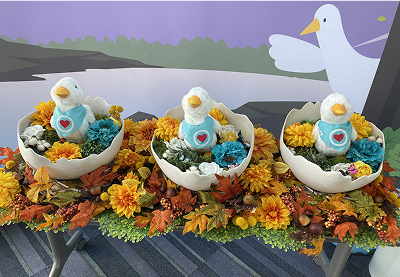 Aflac stuff toys in easter egg shells