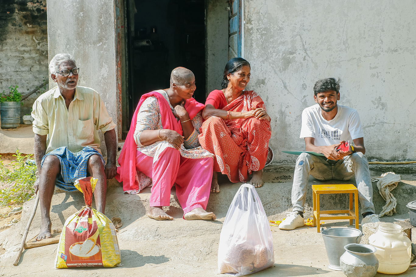 Picture of a family from India laughing 