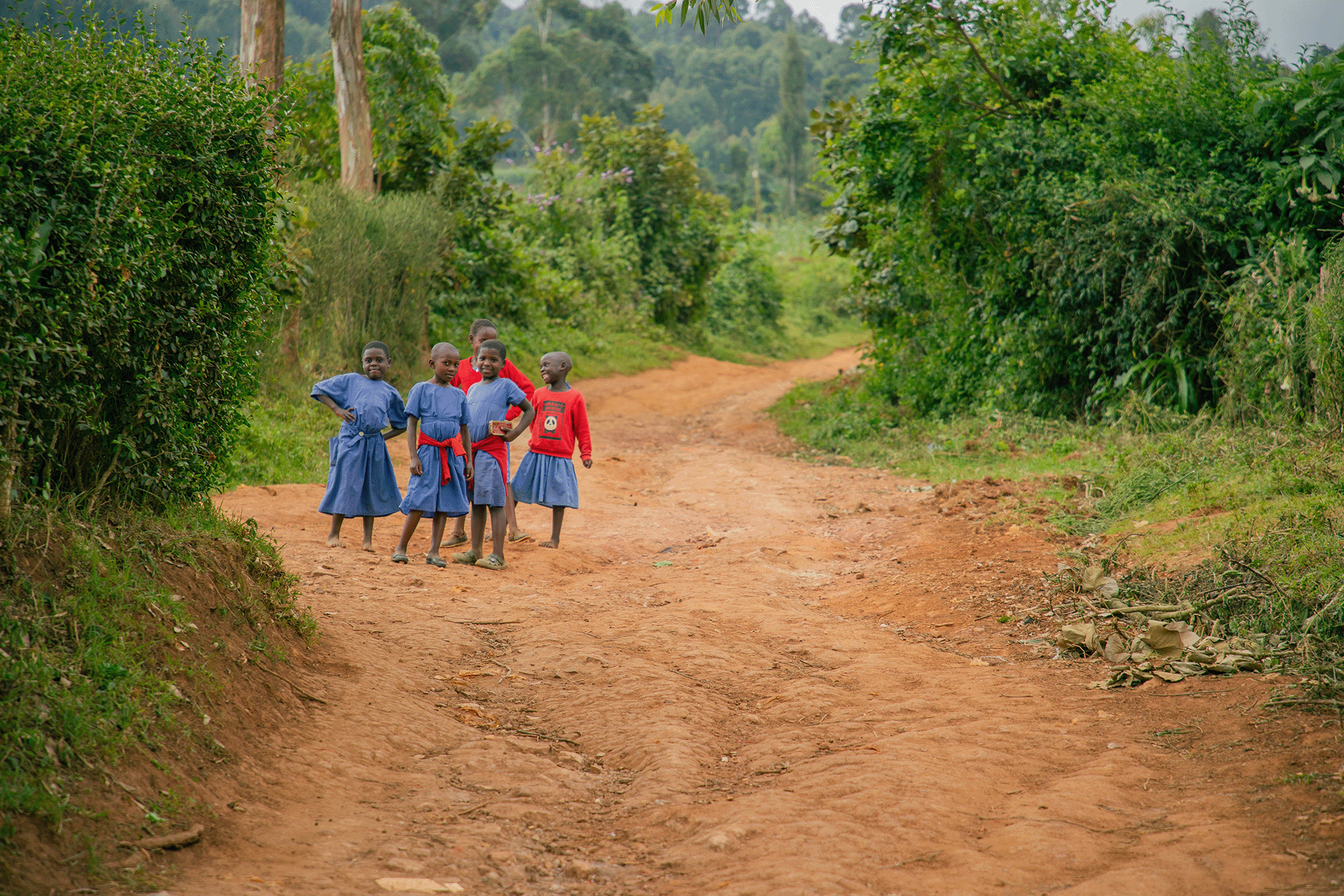group of children on the dirt road