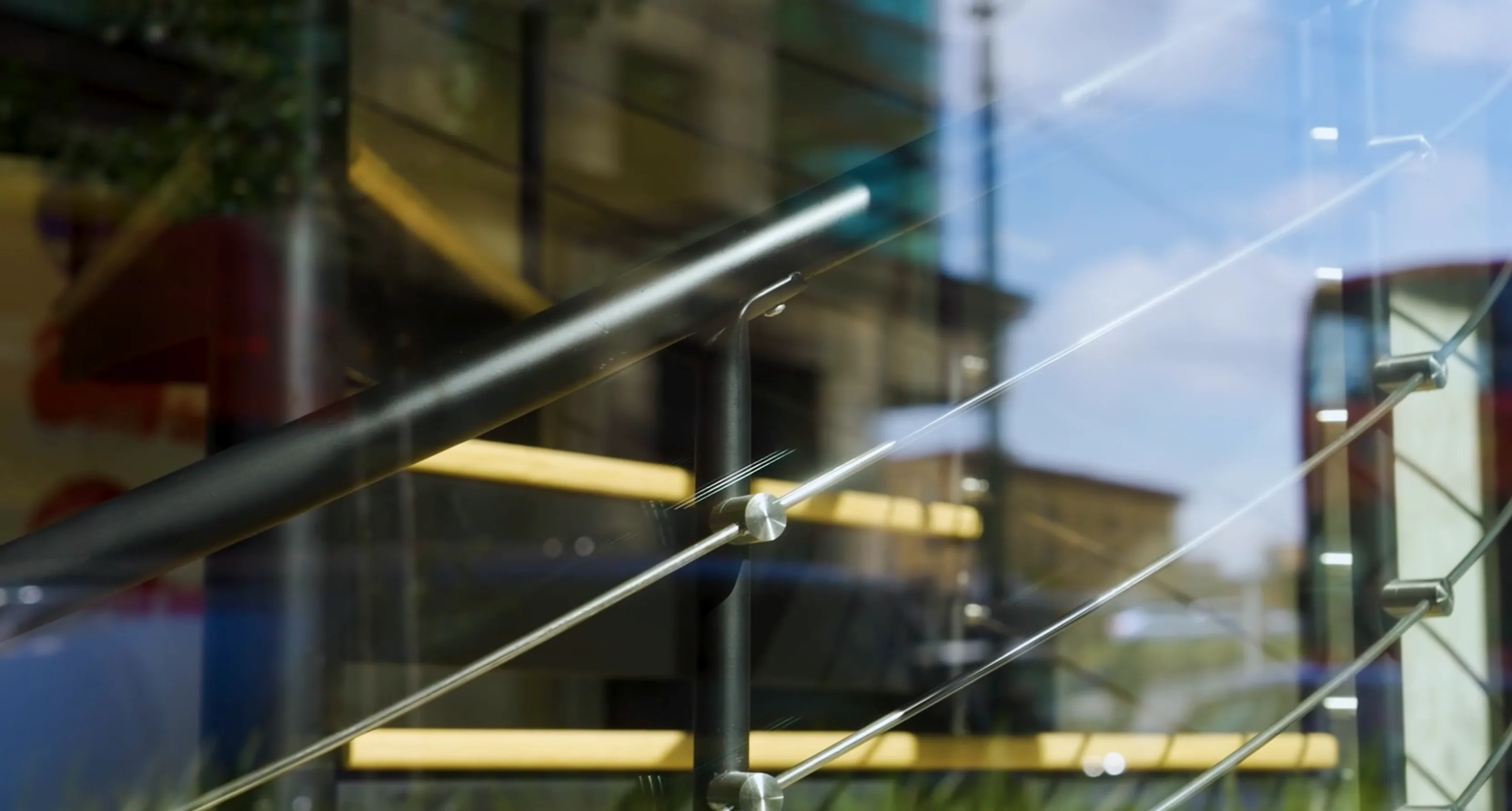 Railcraft International close-up of cable railing hardware and tensioning system