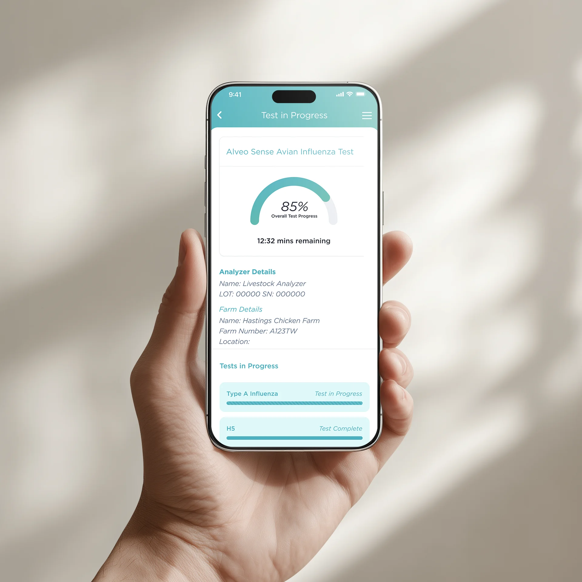 Hand holding smartphone displaying Alveo molecular testing app with US map
