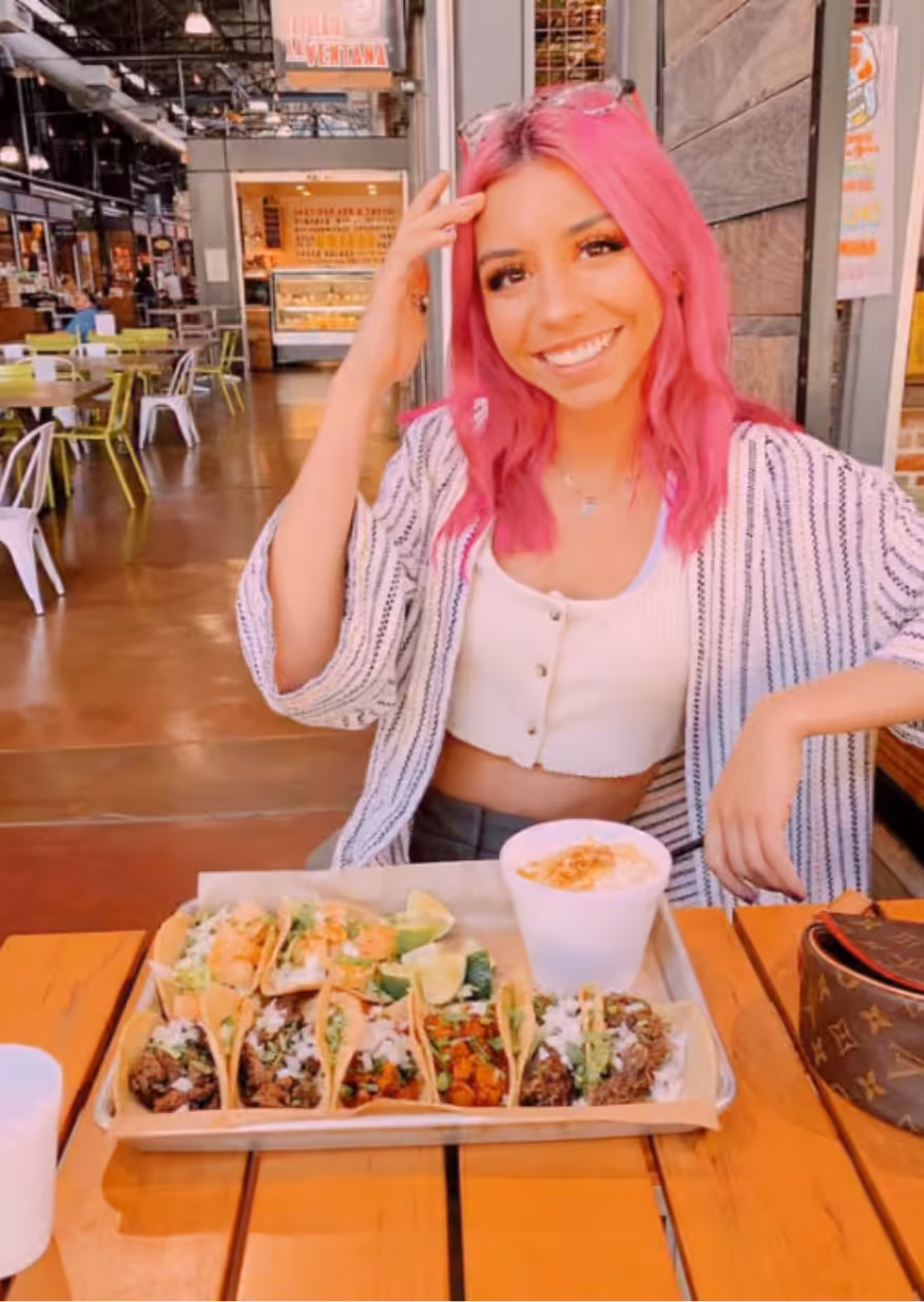 Guest eating tacos at Taqueria La Ventana